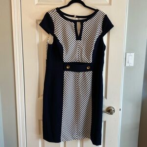 Brand new with tag. Woman’s navy & white dress size 16
